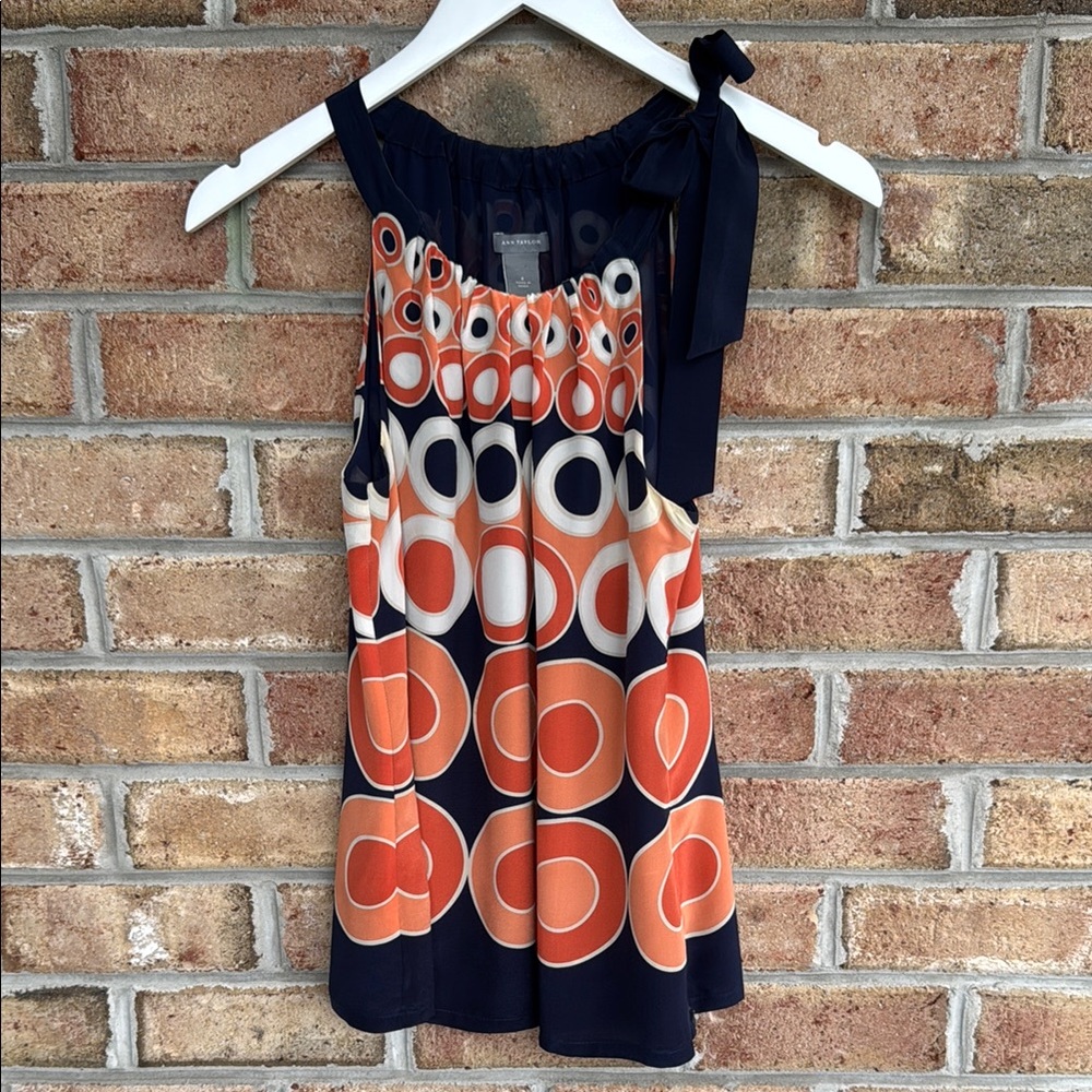 Ann Taylor graphic print top with bow, size 4
